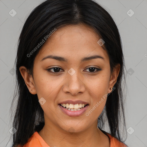 Joyful latino young-adult female with medium  brown hair and brown eyes