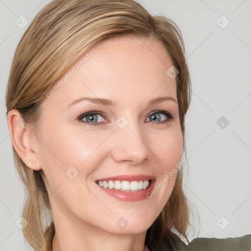 Joyful white young-adult female with long  brown hair and blue eyes