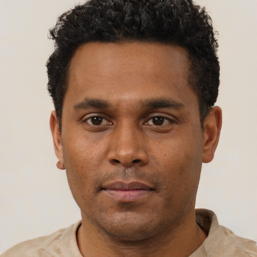 Neutral black young-adult male with short  brown hair and brown eyes