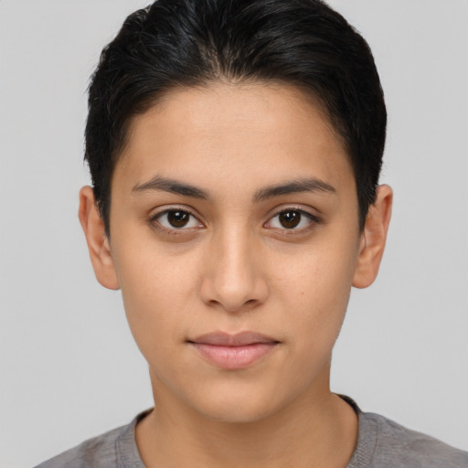 Neutral latino young-adult female with short  brown hair and brown eyes