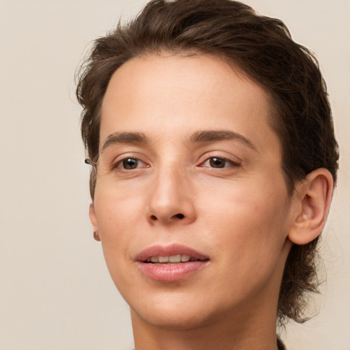 Joyful white young-adult female with medium  brown hair and brown eyes