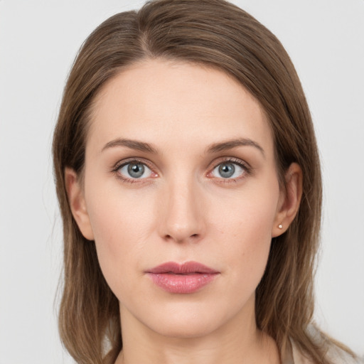 Neutral white young-adult female with long  brown hair and grey eyes