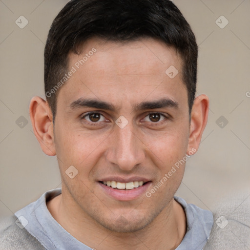 Joyful white young-adult male with short  brown hair and brown eyes