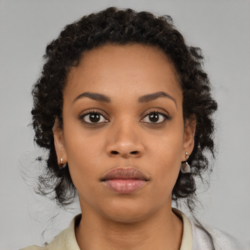Neutral latino young-adult female with medium  black hair and brown eyes
