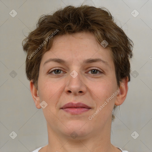 Joyful white adult female with short  brown hair and brown eyes