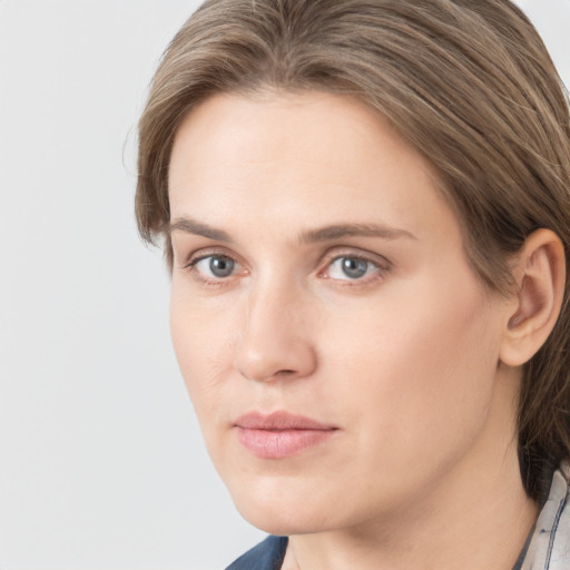 Neutral white young-adult female with medium  brown hair and grey eyes