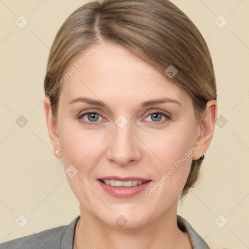 Joyful white young-adult female with medium  brown hair and grey eyes