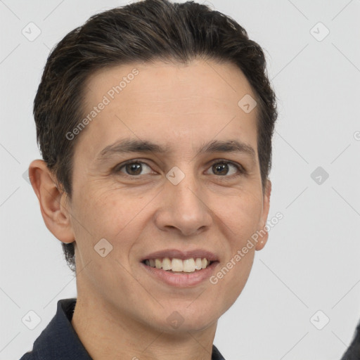 Joyful white adult male with short  brown hair and brown eyes