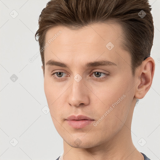 Neutral white young-adult male with short  brown hair and brown eyes