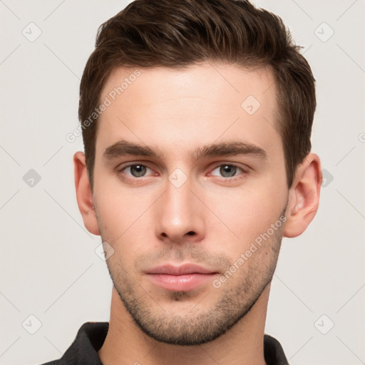 Neutral white young-adult male with short  brown hair and grey eyes