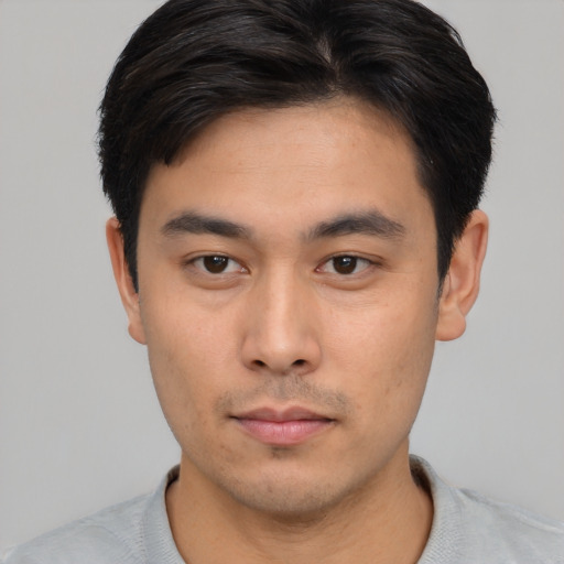 Neutral asian young-adult male with short  brown hair and brown eyes