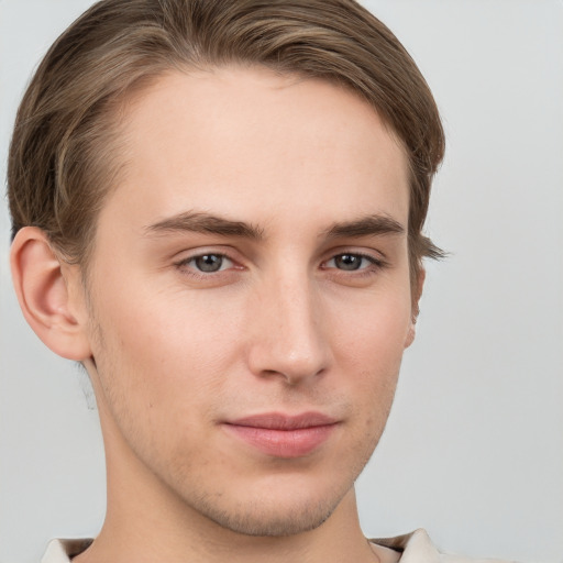 Neutral white young-adult male with short  brown hair and grey eyes