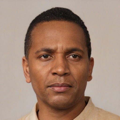 Neutral black adult male with short  black hair and brown eyes