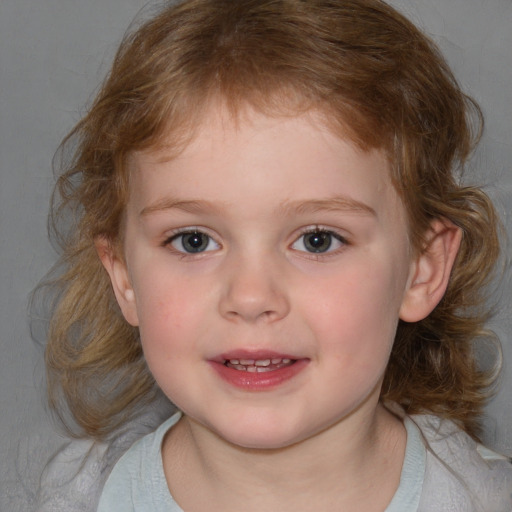 Joyful white child female with medium  brown hair and blue eyes