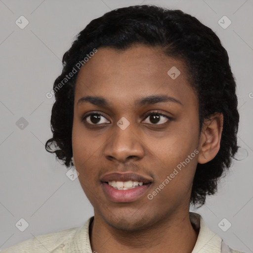 Joyful black young-adult female with short  black hair and brown eyes