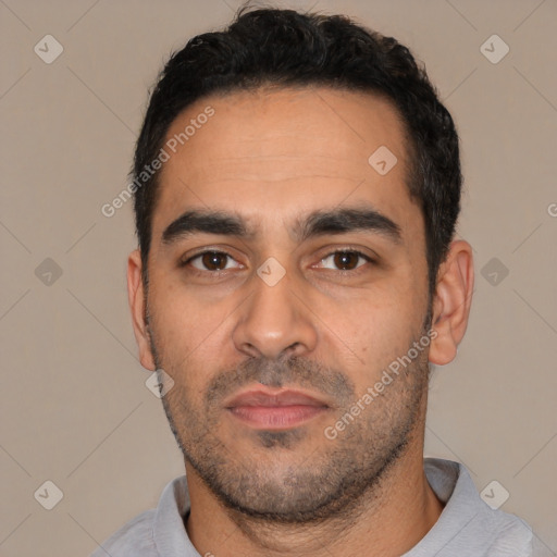 Neutral latino young-adult male with short  black hair and brown eyes