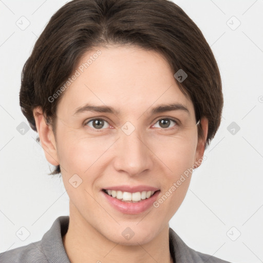 Joyful white young-adult female with medium  brown hair and grey eyes