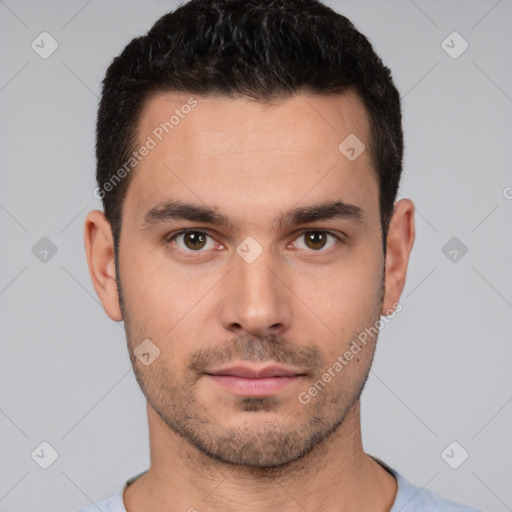 Neutral white young-adult male with short  black hair and brown eyes
