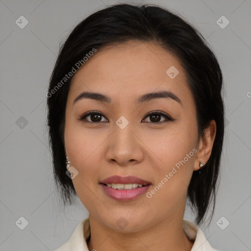 Joyful asian young-adult female with medium  brown hair and brown eyes