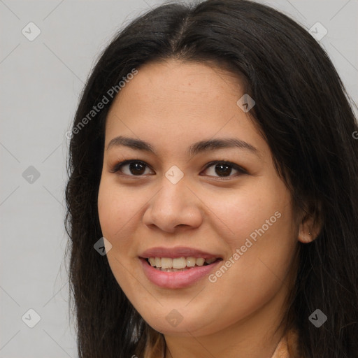 Joyful asian young-adult female with long  brown hair and brown eyes