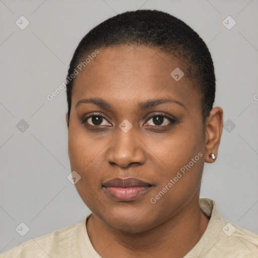 Joyful black young-adult female with short  black hair and brown eyes