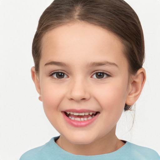 Joyful white child female with medium  brown hair and brown eyes