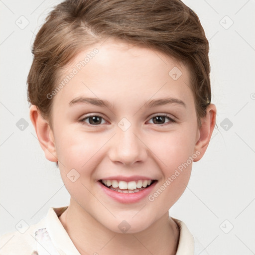 Joyful white child female with short  brown hair and brown eyes