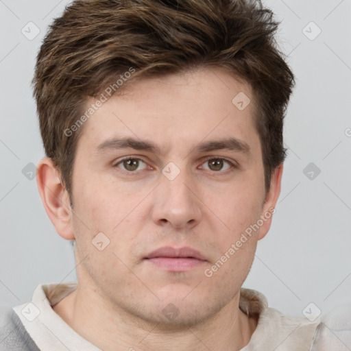 Neutral white young-adult male with short  brown hair and grey eyes