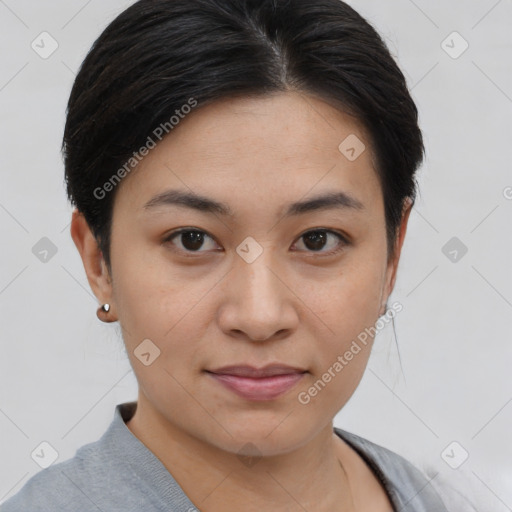 Joyful asian young-adult female with short  brown hair and brown eyes