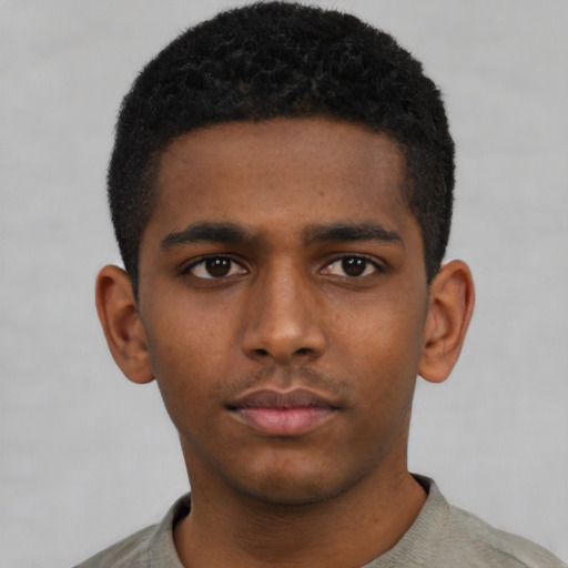 Neutral black young-adult male with short  black hair and brown eyes