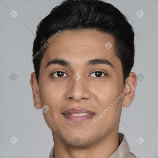 Joyful latino young-adult male with short  black hair and brown eyes