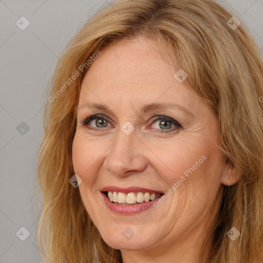 Joyful white adult female with long  brown hair and brown eyes