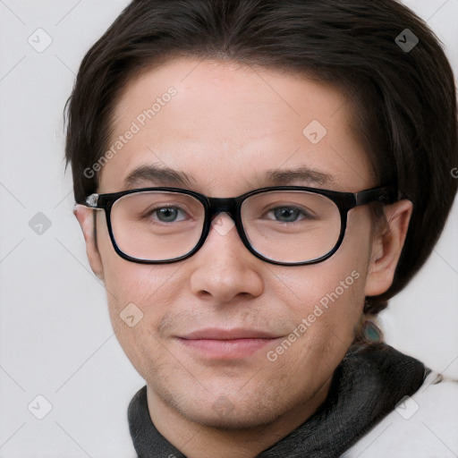 Joyful white young-adult male with short  brown hair and blue eyes