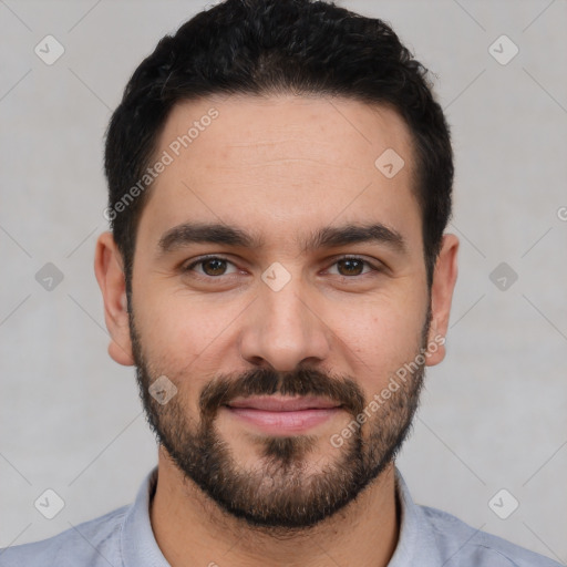 Joyful white young-adult male with short  black hair and brown eyes