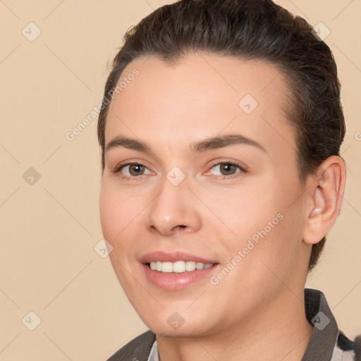 Joyful white young-adult female with short  brown hair and brown eyes