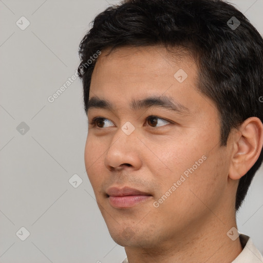 Neutral asian young-adult male with short  black hair and brown eyes