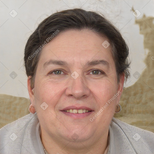 Joyful white adult female with short  brown hair and brown eyes