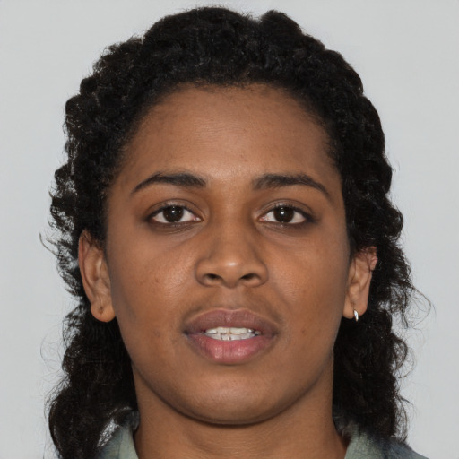 Neutral black young-adult female with long  black hair and brown eyes