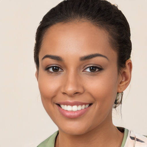 Joyful white young-adult female with medium  brown hair and brown eyes