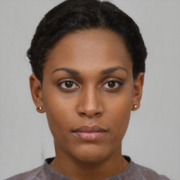 Neutral black young-adult female with short  brown hair and brown eyes