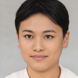 Joyful asian young-adult female with short  brown hair and brown eyes