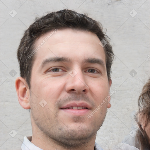 Neutral white young-adult male with short  brown hair and brown eyes