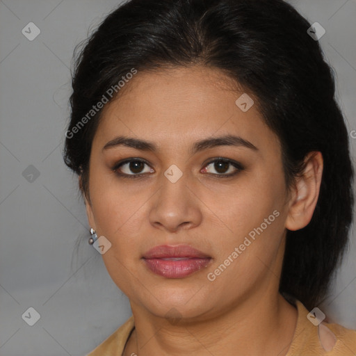 Joyful latino young-adult female with medium  brown hair and brown eyes