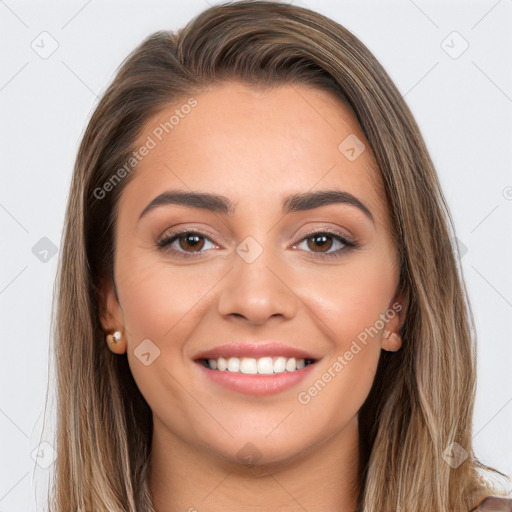 Joyful white young-adult female with long  brown hair and brown eyes