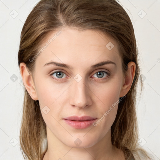 Joyful white young-adult female with long  brown hair and blue eyes