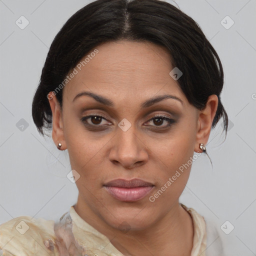 Joyful latino young-adult female with medium  brown hair and brown eyes