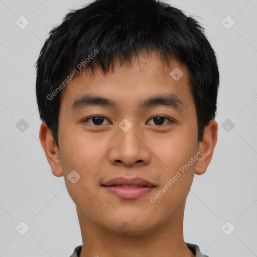 Joyful asian young-adult male with short  black hair and brown eyes