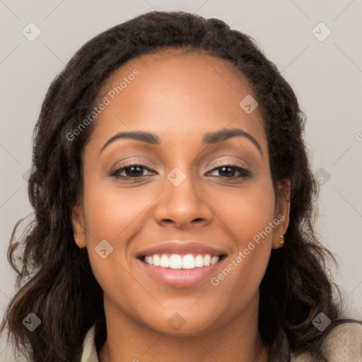 Joyful latino young-adult female with long  brown hair and brown eyes