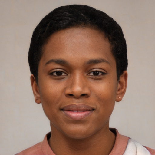 Joyful latino young-adult female with short  black hair and brown eyes