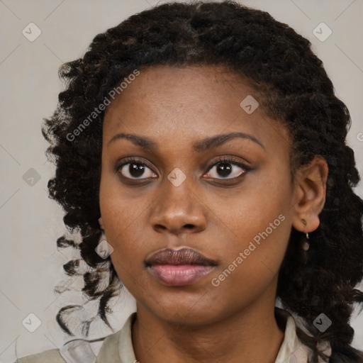 Neutral black young-adult female with medium  black hair and brown eyes